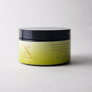 Erinma hair product jar on a white background