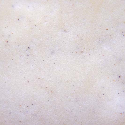 Close-up of the light beige color and texture of "Vanilla" Body Butter